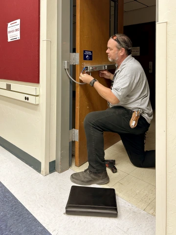 UFS locksmith installing new classroom door lock