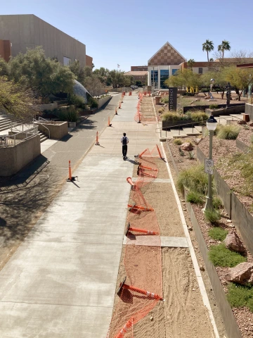 Concrete bicycle path and portions of the two crosswalks as of March 2025