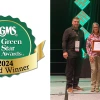Sandra Obenour-Dowd and Mike Sestiaga accepting the 2024 Green Star Grand Award